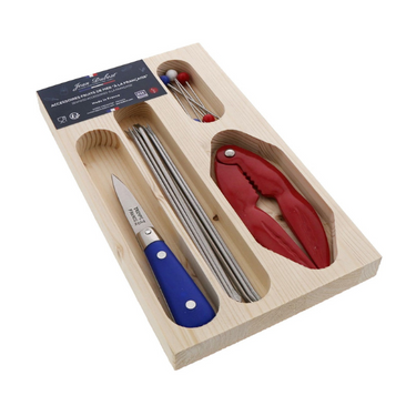 Set of crab cracking tools including a knife, skewers, and a red tool in a wooden box on a white background.