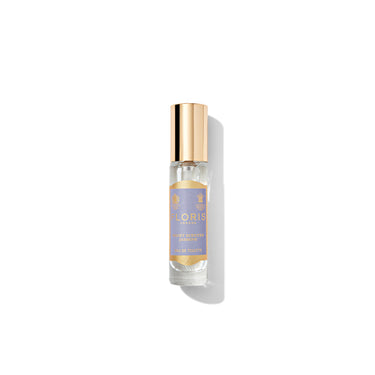 Perfume bottle with gold cap on a white background
