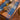Mille Branchages Crepuscule Shown on dining table