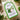 Valente Market pasta package with green label on a beige surface with herbs