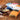 Harbor Sweets Chocolate Bars. One side of the image shows unwrapped Harbor Sweets bars. The other side shows the same bars, fully wrapped.