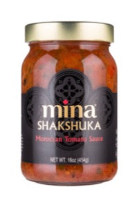 A jar of Mina Shakshuka Moroccan Tomato Sauce with the label visible, showing the product name and net weight of 16 oz (1 Lb 1 Oz) 350g.