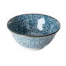 Blue ceramic bowl with floral pattern on a white background