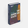 Cookbook titled, “Recipes From The American South” by Michael W. Twitty. Cover features graphics of corn, collard greens, and black-eyed peas. 