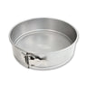Metal springform pan on a white background