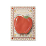 Rifle Paper Co. notepad featuring vintage sewing sampler style. Notepad is shaped like an apple