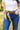 Model wears scarf tied as a belt