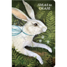 A notebook with a cover featuring a colorful illustration of a rabbit surrounded by greenery and a blue ribbon.