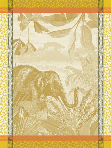 Decorative fabric with elephant and foliage pattern on a yellow background