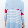 MERSEA’s Amour striped sweater with heart appliqué on elbow. Sweater is pale blue with narrow white stripes. The top stripe is Scarlet, and the heart appliqués are also Scarlet.