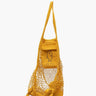 Yellow mesh bag with a fish design on a white background