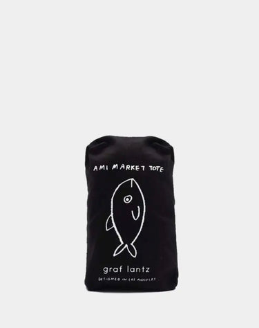 Black tote bag with fish design and text on a white background