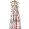 Floral dress on a hanger against a white background