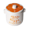 Herbs Special Pizza container with orange lid and text on a white background