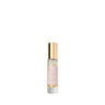 Small perfume bottle with gold cap on a white background