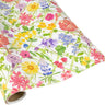 Wrapping paper with colorful florals with green trellis background