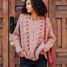 MERSEA’s Ribbons and Romance Collection sweater in Antique Rose. This chunky yet lightweight sweater features contrasting ribbon detail on a lighter background.