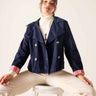 Mersea Sailor Peacoat shown with cuffs turned up to display the red and white striped lining.