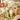 Garnier-Thiebaut ‘Delices D’Automne Potiron’ tablecloth highlighting napkin
