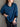 Delmar V-Neck Sweater in Deep Teal shown worn over a black collared shirt