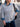 Delmar V-Neck Sweater in Silver Cloud worn over a chambray collared shirt