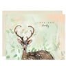 this charming greeting card featuring a beautifully drawn deer with heart-shaped antlers. The playful front message "Love You Deerly" delivers a sweet pun perfect for Valentine's Day, anniversaries, or any occasion to show someone they're loved.