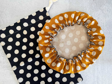 Bread Makers Set- Bowl Cover and Bread Bag | Polka Dot - bread bag is black with white polka dots. The bowl cover is mustard yellow with white polka dots