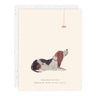 Card with a dog illustration and text on a beige background
