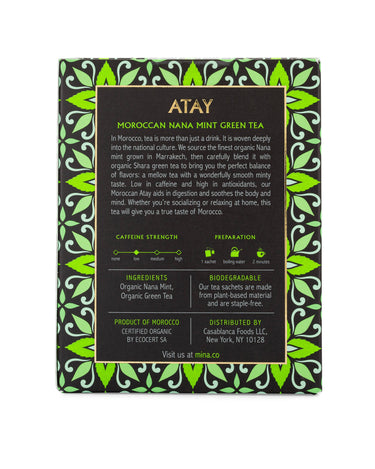 Tea box with green leaf design and text on a white background